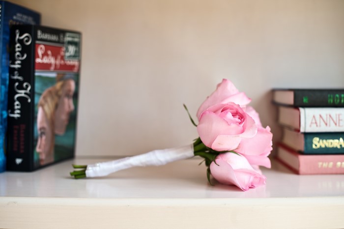 Pink Roses Bouquet on Shelf with Books