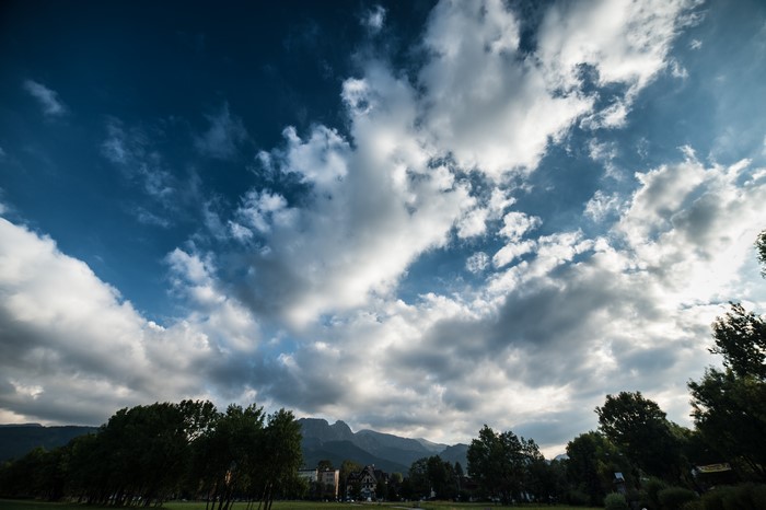 Zakopane, Poland: Sky and Clouds Over Mountains and Trees