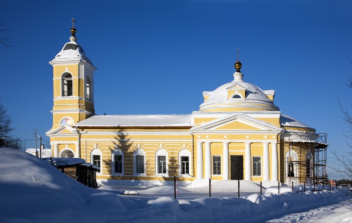 Yellow Church with Bell Tower in Winter