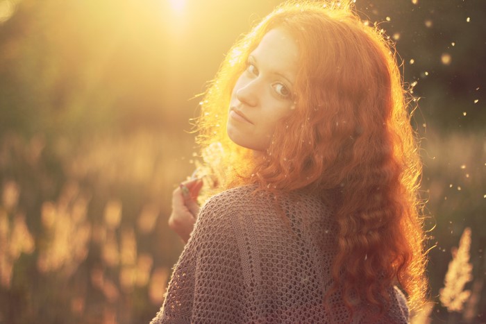 Redhead girl in sunlight