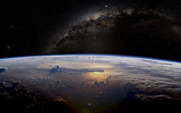 Earth and the Milky Way galaxy from space