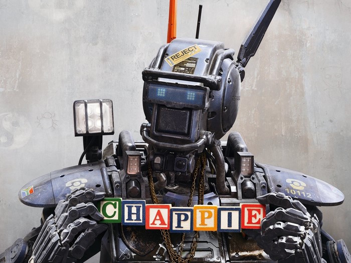 Chappie robot holding alphabet blocks