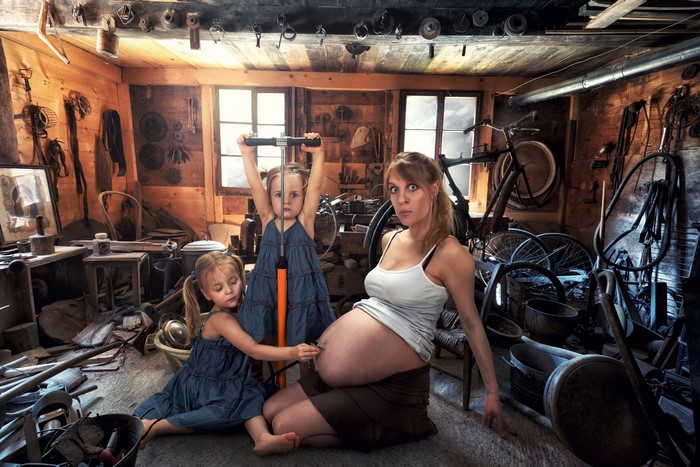 Mother and daughters in a workshop