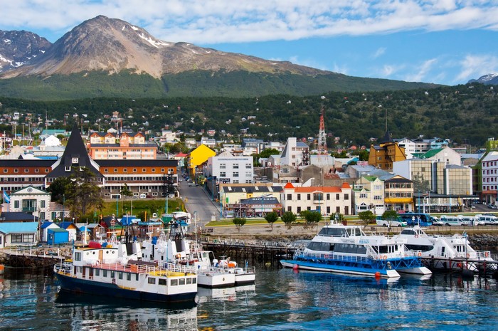 Ushuaia, Argentina harbor with boats and mountains