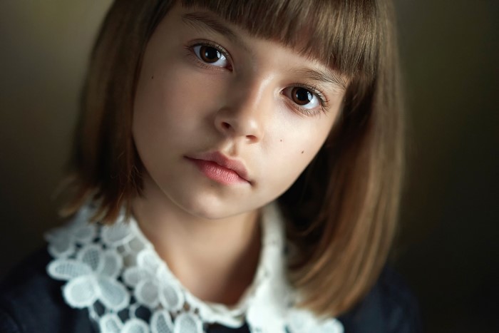 Portrait of a Brown-Haired Little Girl with Lace Collar