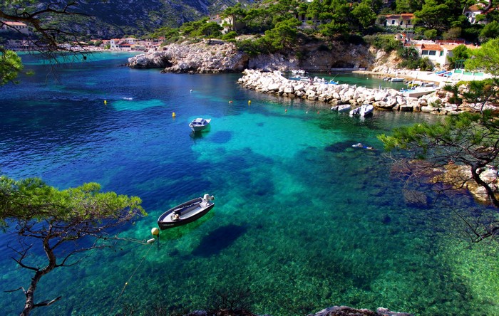 Boats in a clear blue bay near Marseille, France