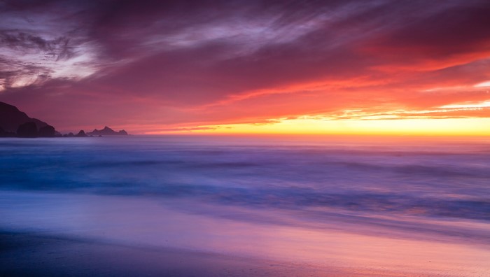 Sunset over the ocean at Rockaway Beach, Pacifica, California