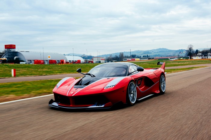 Red 2015 Ferrari FXX K on a Racetrack