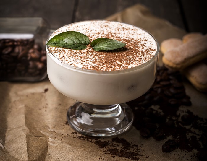 Tiramisu dessert with coffee beans and ladyfingers