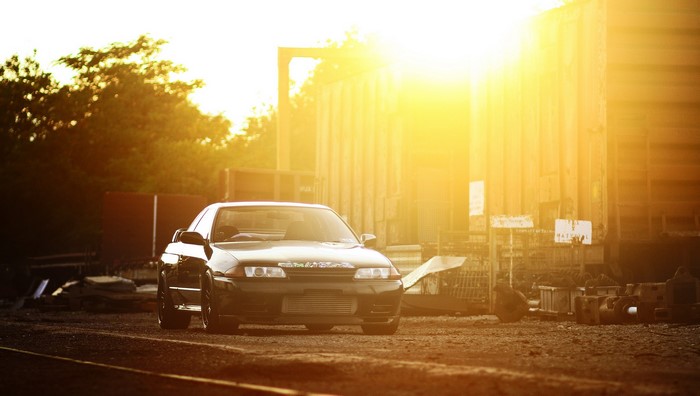 Nissan Skyline GT-R R32 parked at sunset