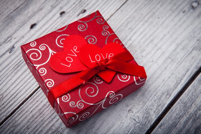 Red gift box with hearts for Valentine's Day