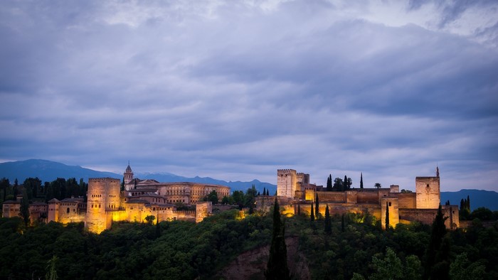 The Alhambra palace complex in Granada, Spain at dusk