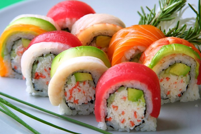 Assortment of colorful sushi rolls on a plate