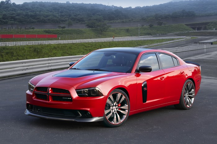 Red Dodge Charger on a Racetrack