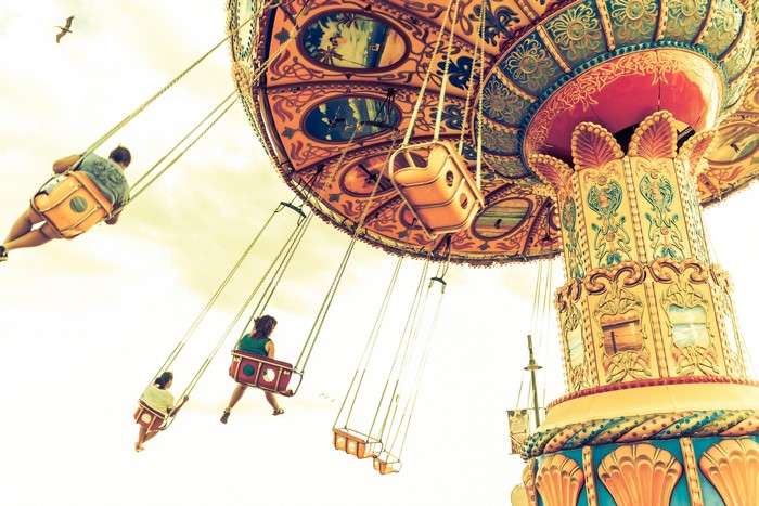 Carousel ride with people swinging
