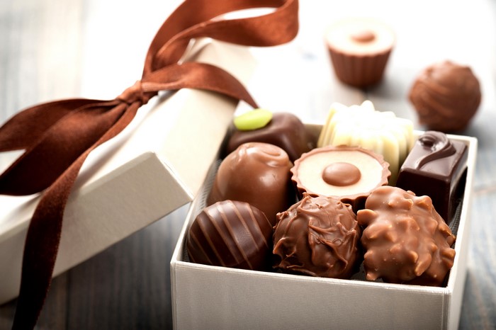 Box of assorted chocolates with ribbon