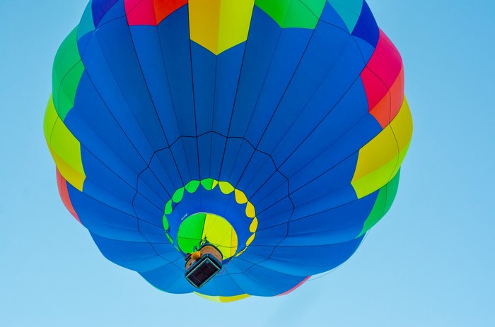 Colorful hot air balloon against a blue sky
