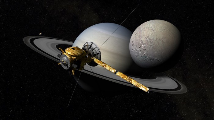 Cassini spacecraft near Saturn and Enceladus