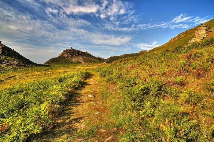 Path through Exmoor National Park with mountains and sky