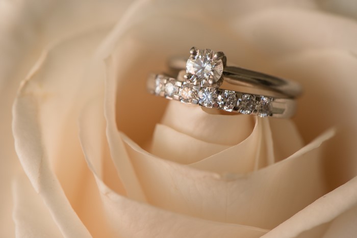 Diamond Wedding Rings on a Rose