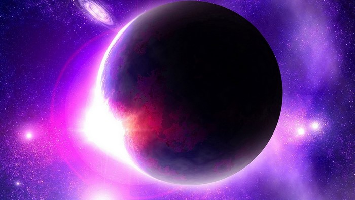 Planet in a purple galaxy with a bright light