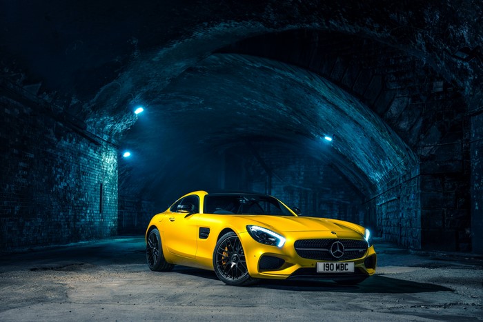 Yellow 2015 Mercedes-Benz AMG GT S in tunnel