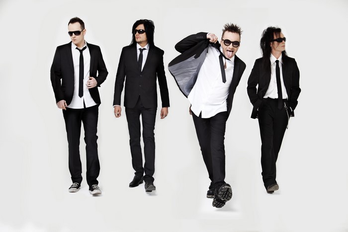 Four men in suits