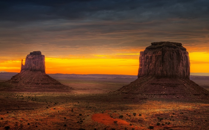 Monument Valley at sunset with dramatic clouds