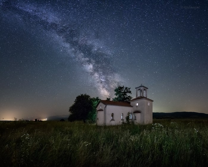 Milky Way over a small church in Bulgaria at night