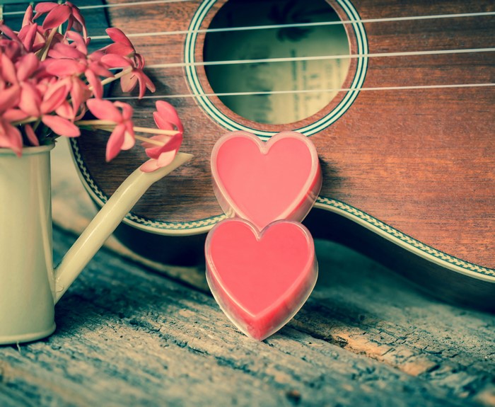 Ukulele with pink flowers and heart decorations