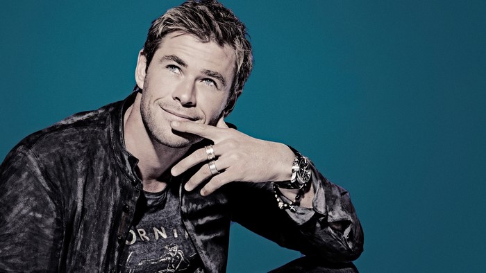 Chris Hemsworth posing for a portrait