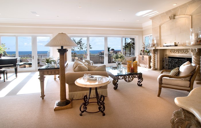 Living room with fireplace and ocean view
