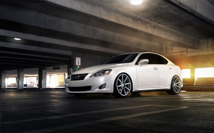 White Lexus IS250 in a parking garage