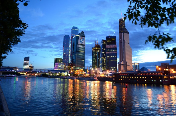Moscow City skyscrapers and Moskva River at dusk