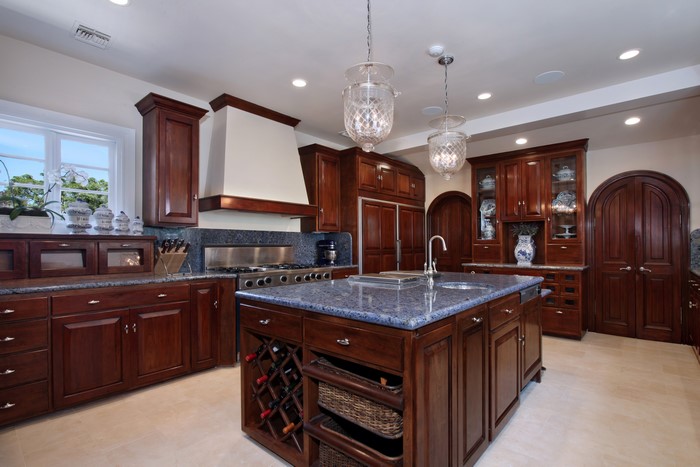 Luxury Kitchen with Dark Wood Cabinets and Island