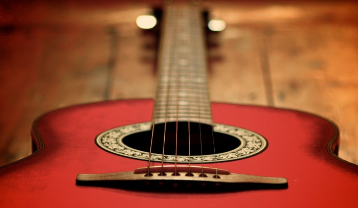 Red Acoustic Guitar Closeup