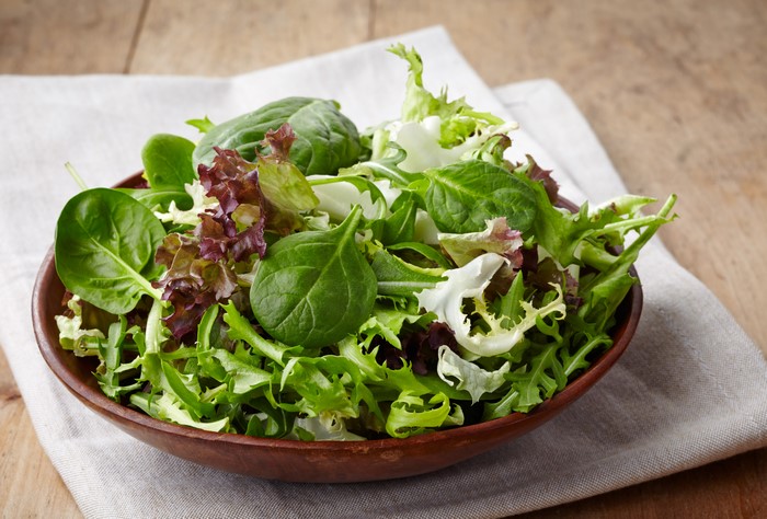 Salad in a wooden bowl
