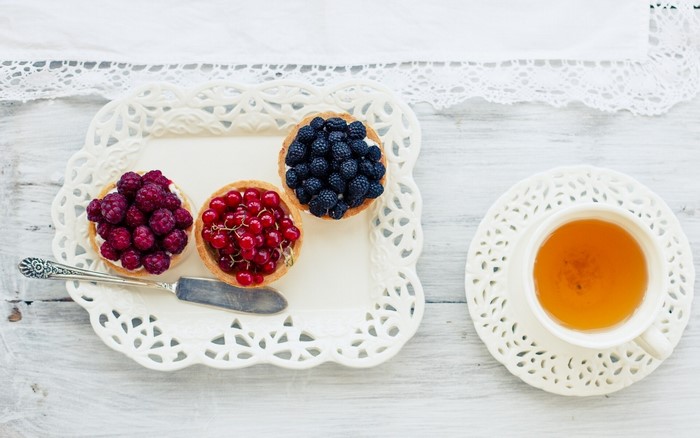 Tea and Berry Tarts on a White Tray
