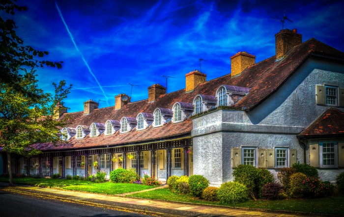 Row of houses with arched dormer windows in Port Sunlight, England