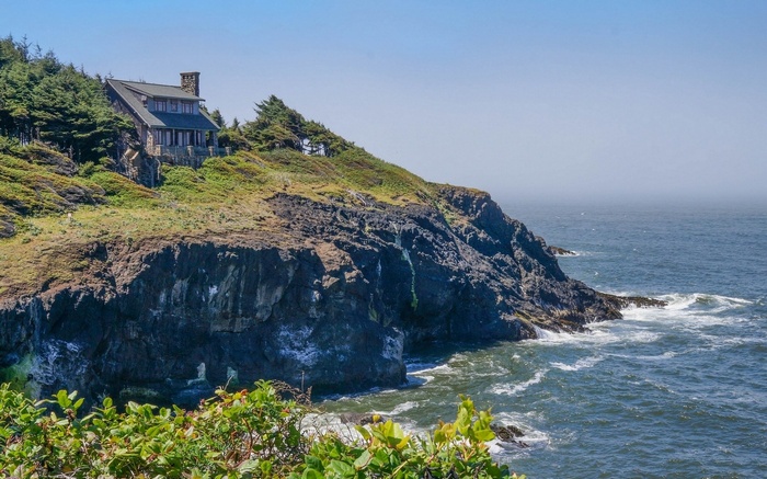 House on a cliff overlooking the ocean