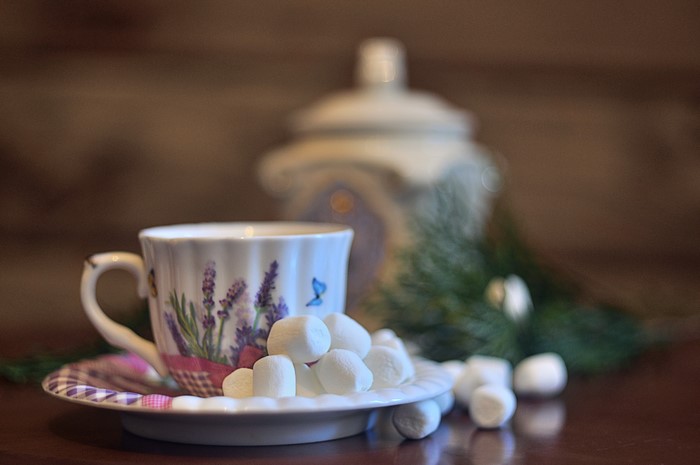 Cup of hot drink with marshmallows