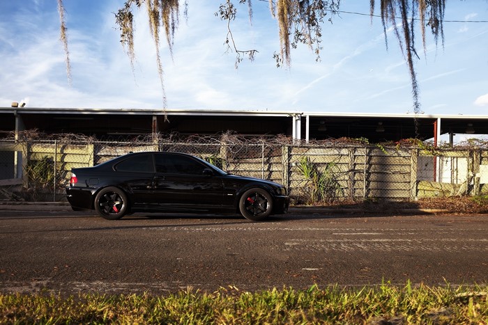 Black BMW M3 E46 parked on the side of the road