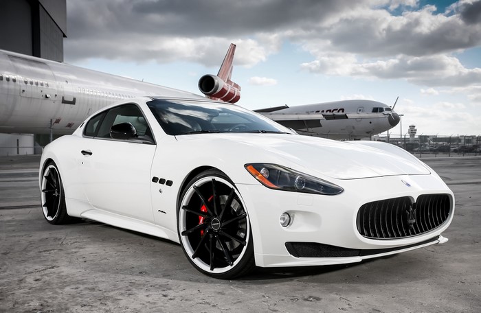 White Maserati GranTurismo with Vossen Wheels at Airport