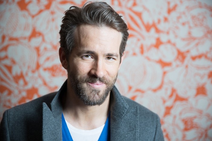 Ryan Reynolds in a grey coat