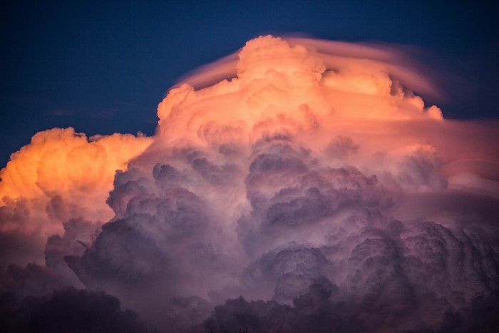 Sunset clouds with orange and purple hues