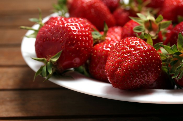 Strawberries on a white plate