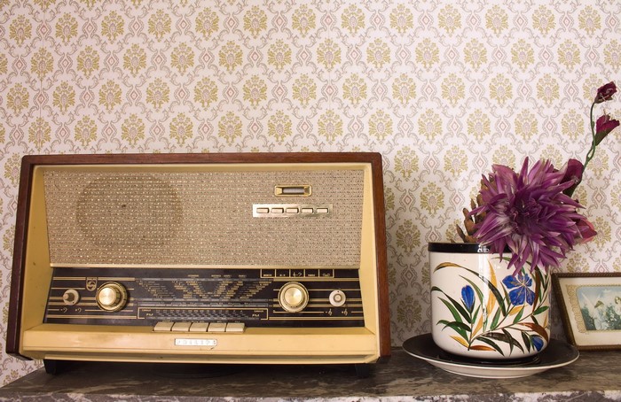 Retro Philips radio with flowers and picture frame