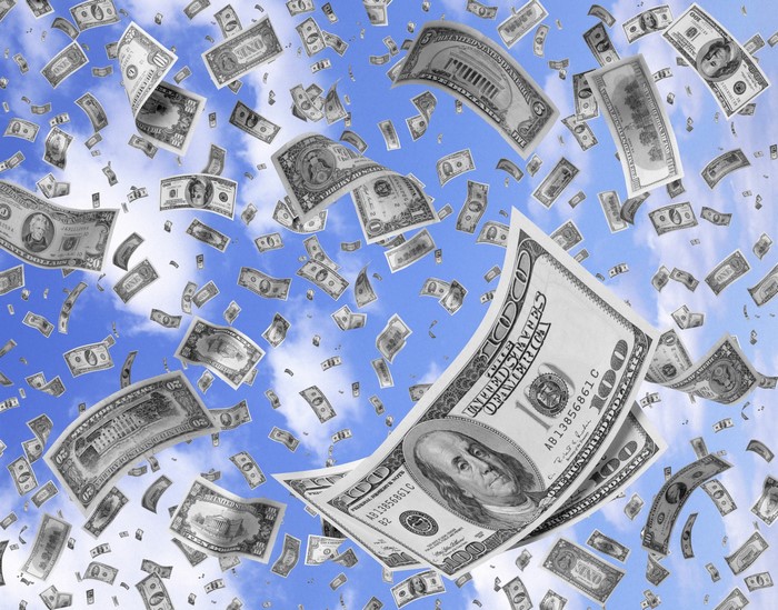 US Dollar Bills Falling from the Sky