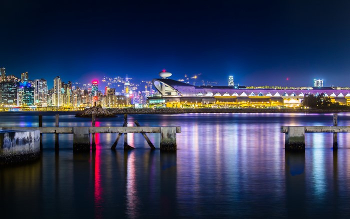 Hong Kong skyline at night with Kwun Tong Ferry Pier