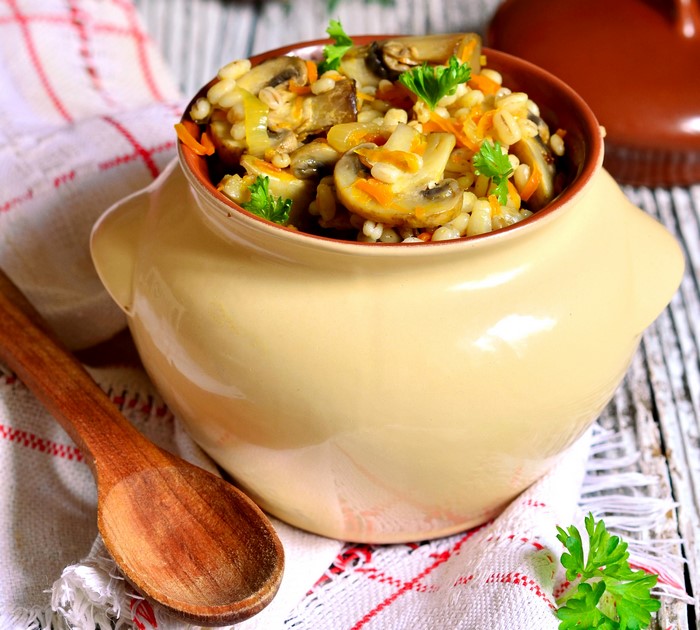 Hearty mushroom and barley stew in a pot